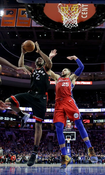 Lowry has big half amid trade rumors, Raptors hold off 76ers